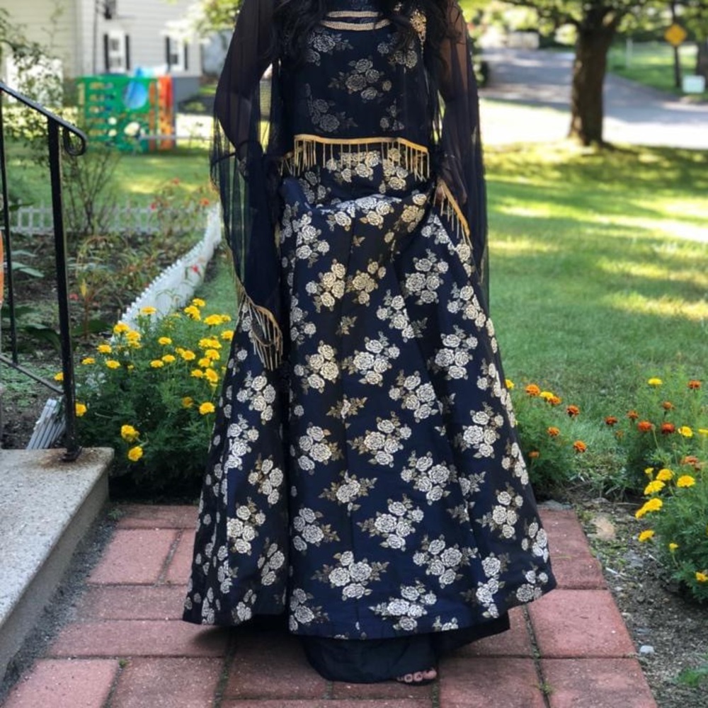 Navy blue gown with net embellished cape
